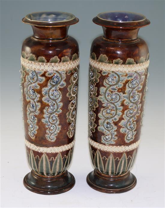 George Tinworth for Doulton Lambeth. A pair of stoneware vases, c.1871, height 32cm (12.5in.), one rim damaged